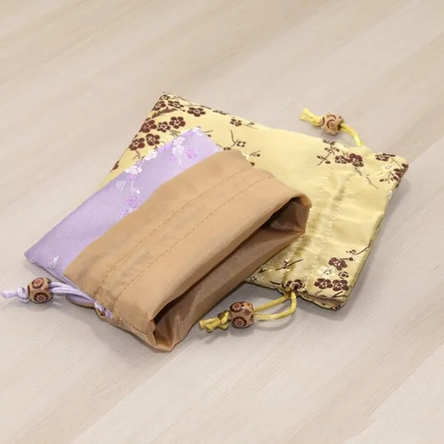 Handcrafted Embroidered Silk Jewelry Pouches | Elegant Packaging Solutions for Jewelry Merchants Needing Custom and High-End Presentation - Embroidered silk jewelry pouches2