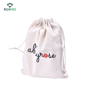 Custom-Printed Fabric Pouches for Branding | Tailored Packaging Solutions for Jewelry Merchants Needing Unique and Branded Presentation - small cotton jewlery pouches with custom logo printing 002