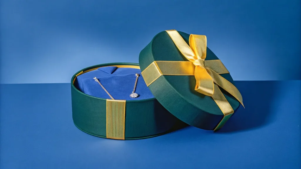 The Beauty of Dune Jewellery: How to Showcase the Ocean in Packaging - fine jewellery gift wrapping round box with round