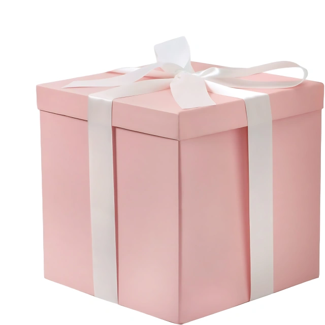 A small, square blue gift box with a glittery top, adorned with a large, dark blue satin bow.