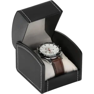 Black leather stitched jewelry box holding a wristwatch
