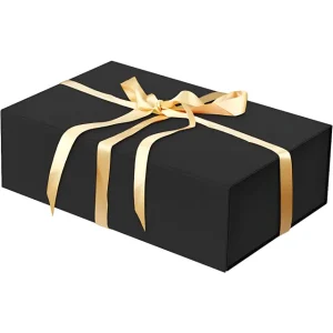 A rectangular black gift box adorned with elegant golden satin ribbons tied into a neat bow, ready for gifting.