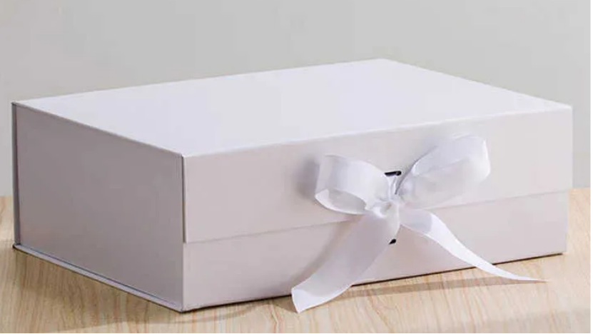 white gift box with ribbon
