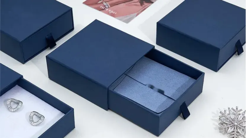 navy blue jewelry boxes with diamond earrings