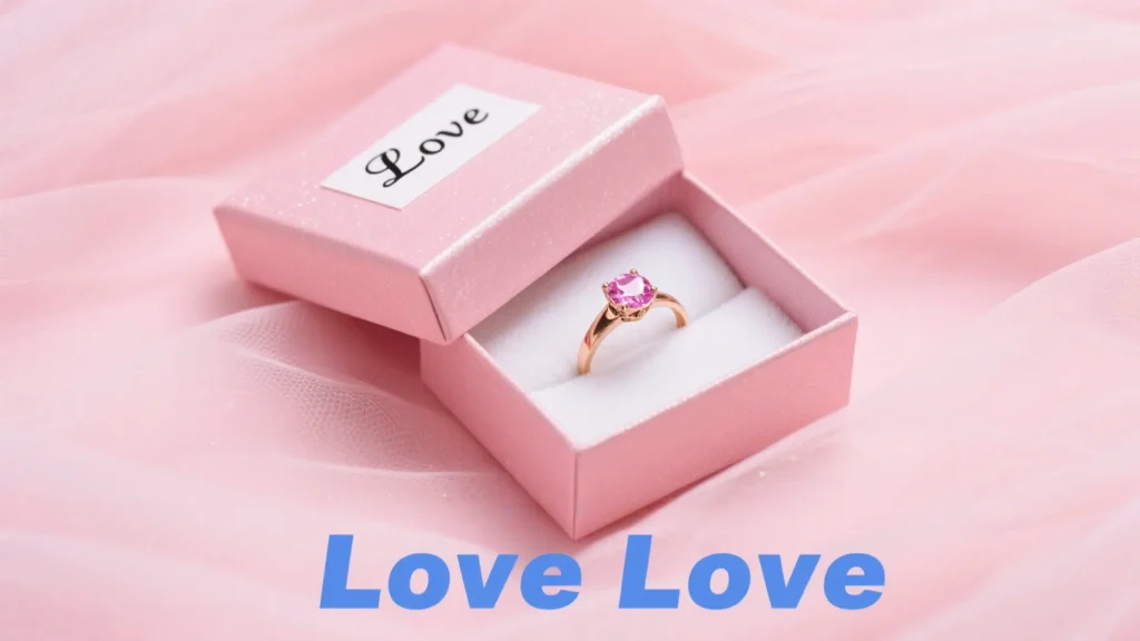 pink jewelry box with ring and love love text
