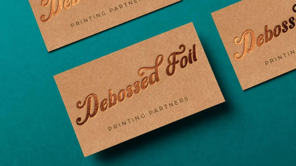 debossed foil business cards on teal