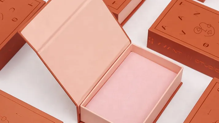 open pink jewelry box with orange casing