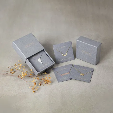 pastel jewelry packaging set on pink background