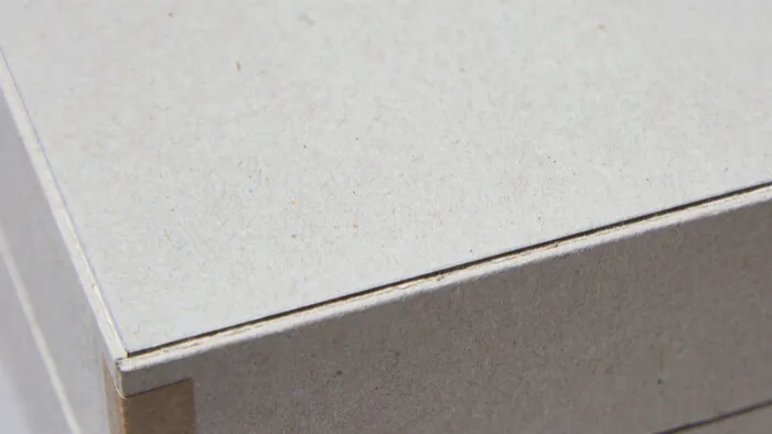 smooth grey paperboard material closeup