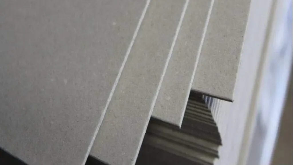 stacked grey cardboard sheets texture