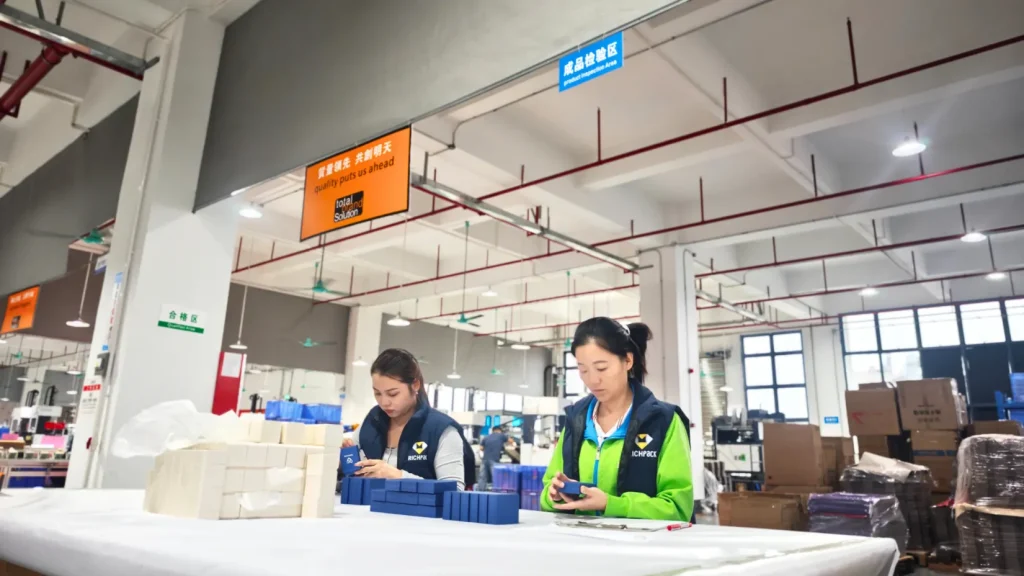 jewelry box factory interior with workers and equipment