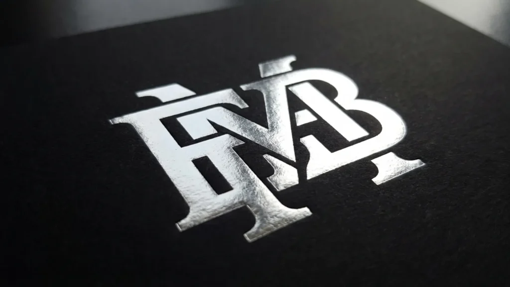 silver embossed logo black paper