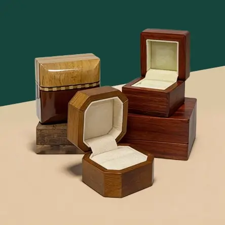 Handcrafted wooden jewelry boxes in various wood finishes, with soft velvet lining for rings and fine jewelry.